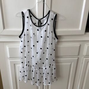 Cute ruffled bottom sleeveless shirt